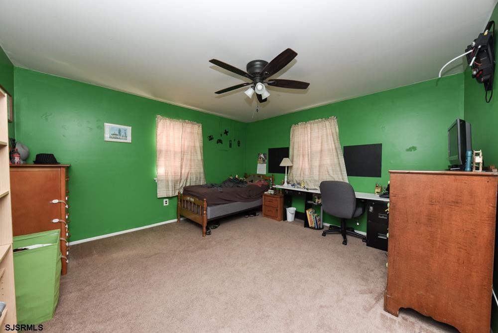 10 Williams Way Ocean View, NJ 08230 - Photo 24 of 28 a living room with furniture and a window