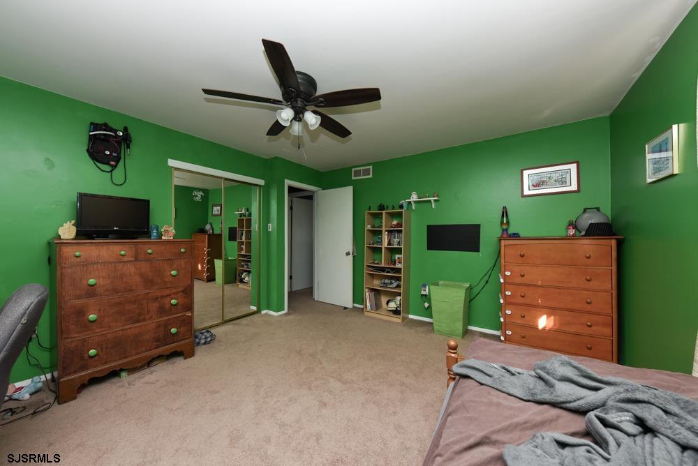 10 Williams Way Ocean View, NJ 08230 - Photo 25 of 28 a room with a bed and furniture