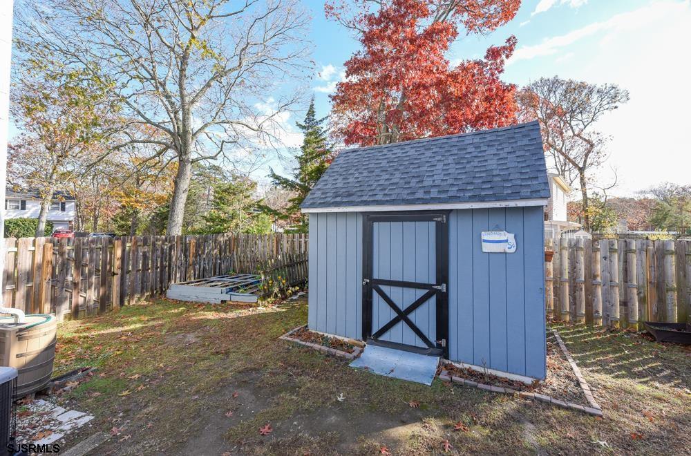 10 Williams Way Ocean View, NJ 08230 - Photo 8 of 28 a view of a wooden house with a large tree and wooden fence