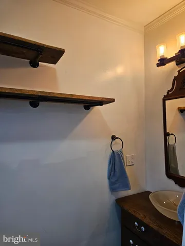a bathroom with a toilet a sink and bathtub