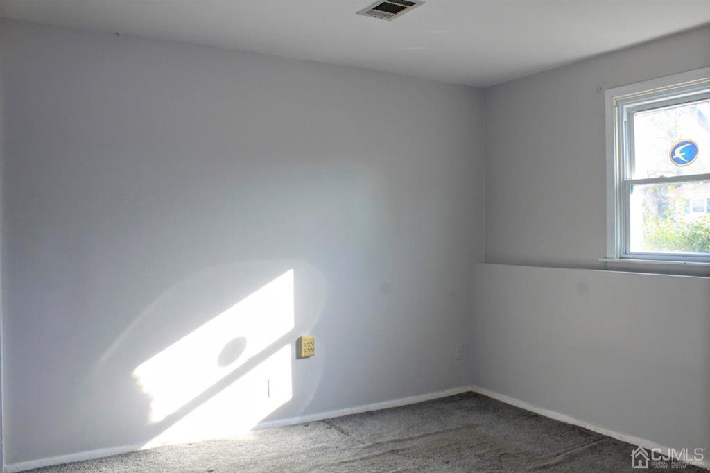 9 A Birch Drive Jackson, NJ 08527 - Photo 17 of 27 an empty room with windows