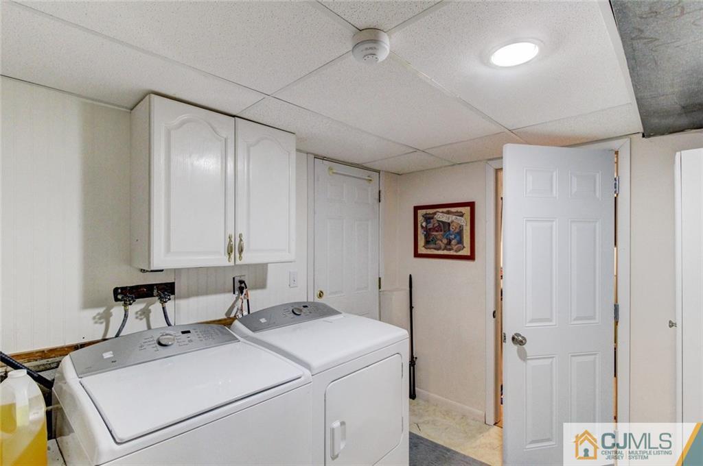 9 A Birch Drive Jackson, NJ 08527 - Photo 19 of 27 a view of storage and utility room with washer and dryer