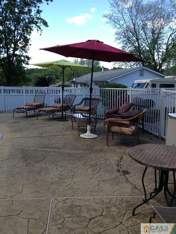 9 A Birch Drive Jackson, NJ 08527 - Photo 24 of 27 a view of a chair and table in the patio