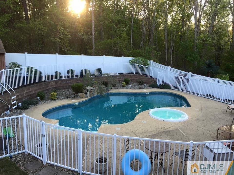 9 A Birch Drive Jackson, NJ 08527 - Photo 25 of 27 a view of a backyard with sitting area