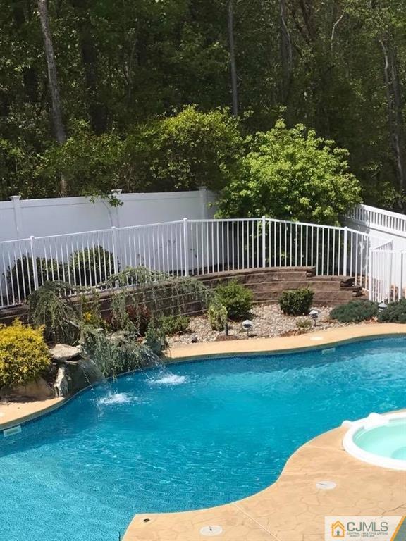 9 A Birch Drive Jackson, NJ 08527 - Photo 27 of 27 a front view of a garden