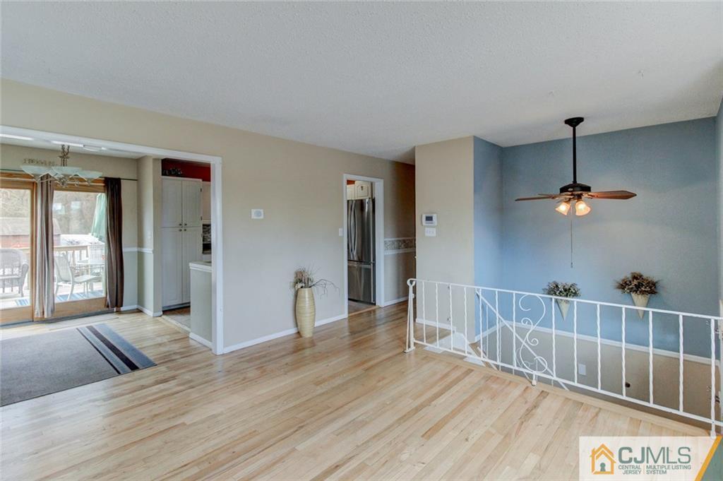 9 A Birch Drive Jackson, NJ 08527 - Photo 5 of 27 a view of a bedroom and wooden floor