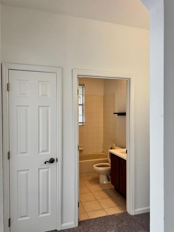 3001 Greystone Loop, Unit 201 Kissimmee, FL 34741 - Photo 14 of 26 a view of a bathroom from the hallway