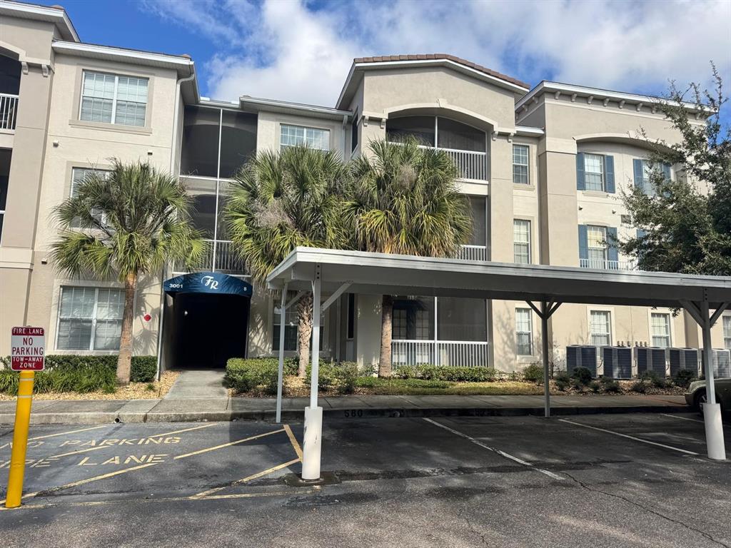 3001 Greystone Loop, Unit 201 Kissimmee, FL 34741 - Photo 21 of 26 a front view of a house