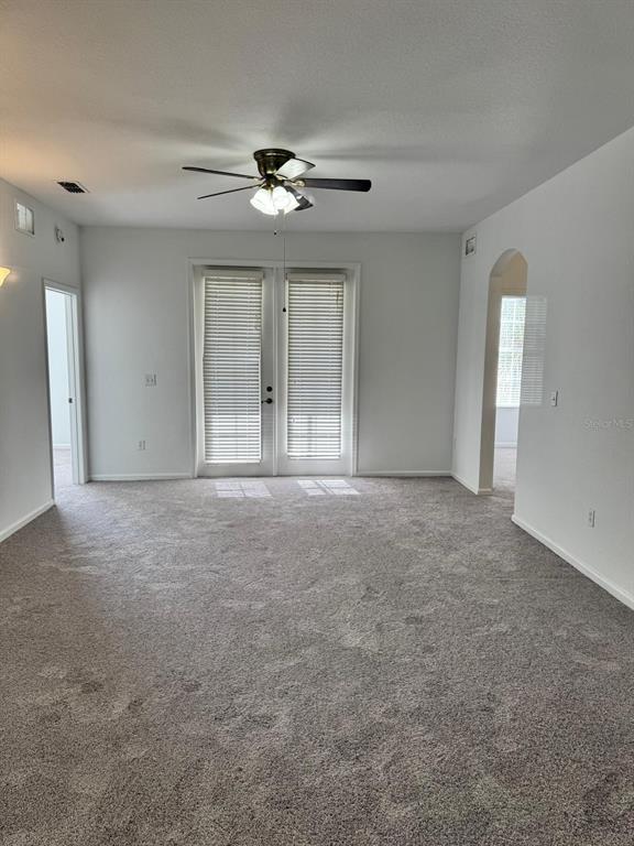 3001 Greystone Loop, Unit 201 Kissimmee, FL 34741 - Photo 4 of 26 a view of an empty room with a window
