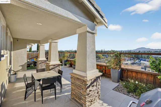 a view of house with outdoor space and parking space