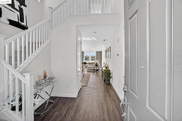 a view of entryway with wooden floor