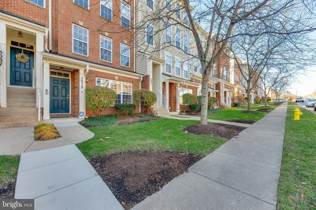 a view of a building with a yard