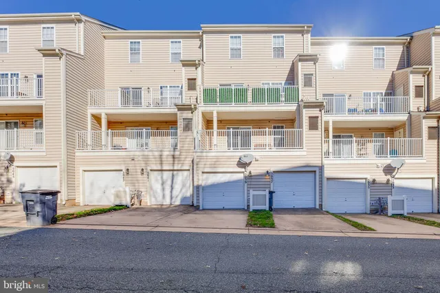 a front view of a building with a street