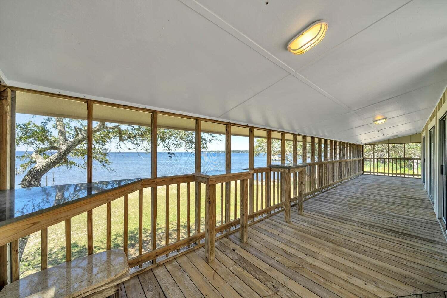 2030 Bay Grove Road Freeport, FL 32439 - Photo 14 of 22 a view of hallway with wooden floor