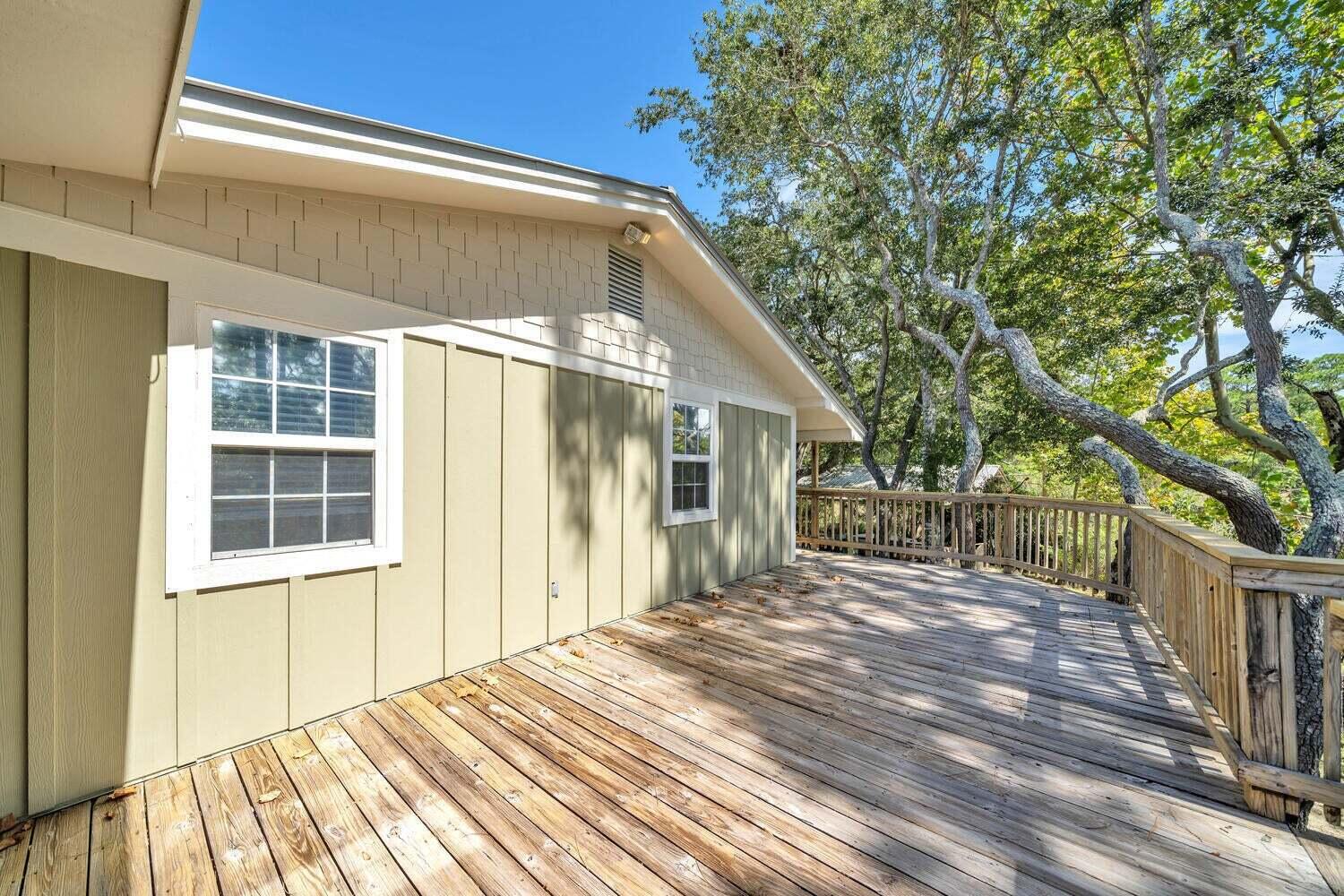 2030 Bay Grove Road Freeport, FL 32439 - Photo 15 of 22 a front view of a house with a yard