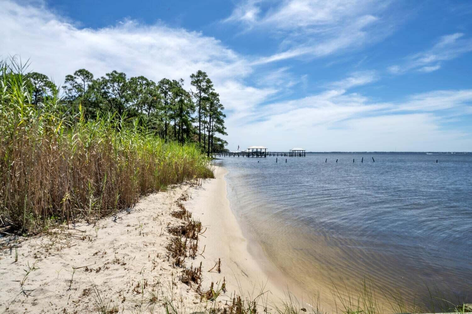 2030 Bay Grove Road Freeport, FL 32439 - Photo 20 of 22 a view of a lake and mountain in the back