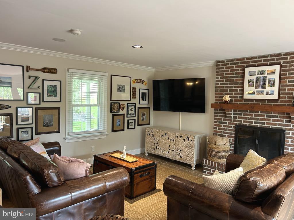 975 Wind Song Road West Chester, PA 19382 - Photo 6 of 25 Family rm with fireplace