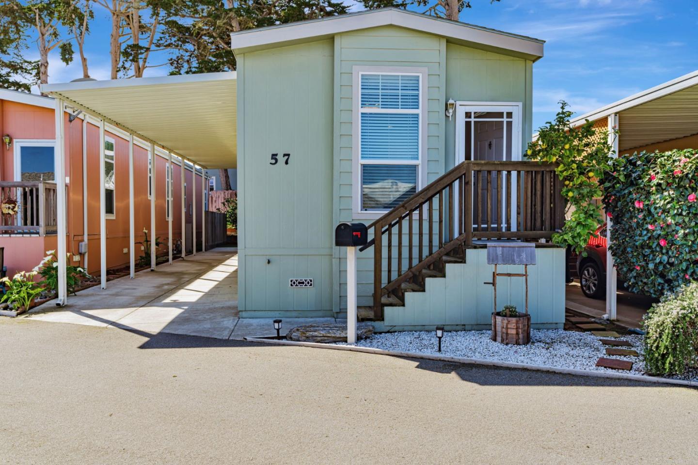 a view of a house with wooden fence and windows