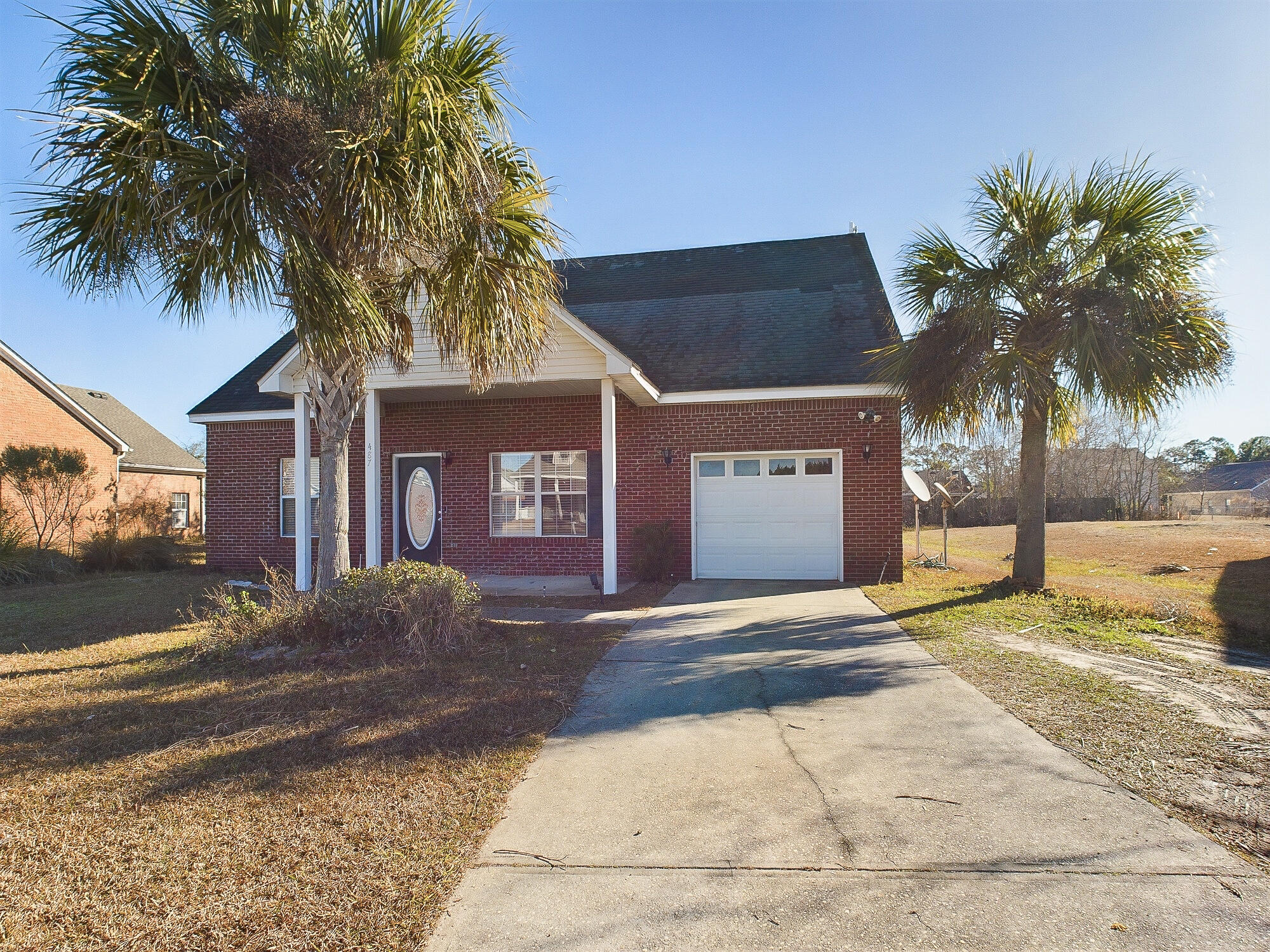 487 Tropical Way Freeport, FL 32439 - Photo 1 of 21 Front