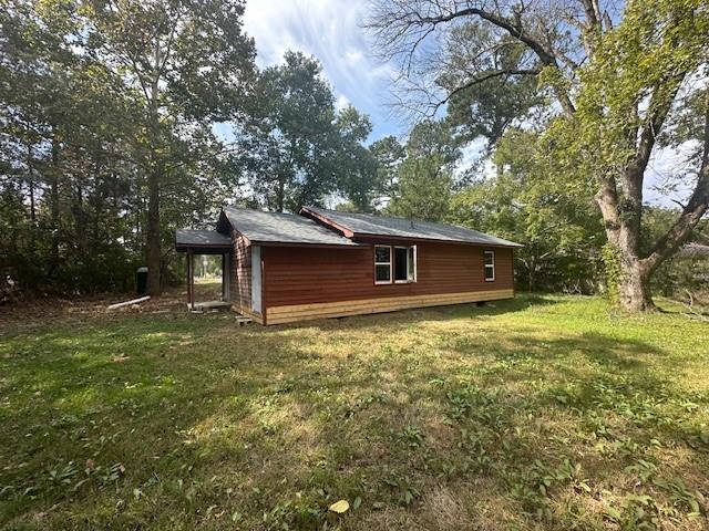 756 Old Summerville Road Northwest Rome, GA 30165 - Photo 12 of 13 a backyard of a house with lots of green space