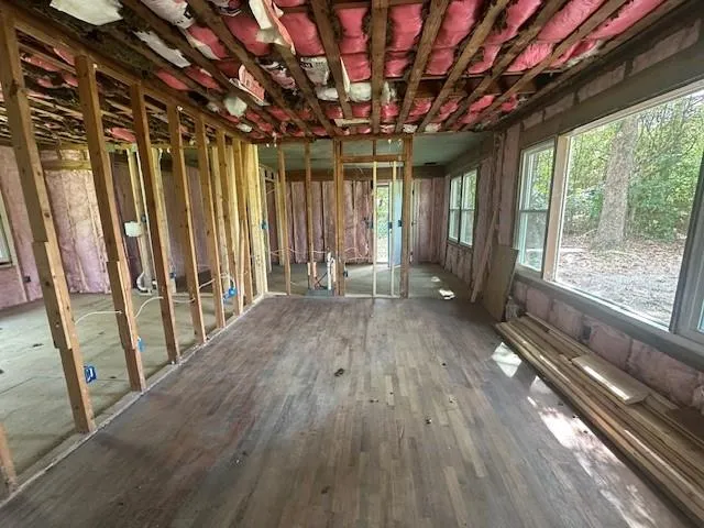 a view of entryway with wooden floor