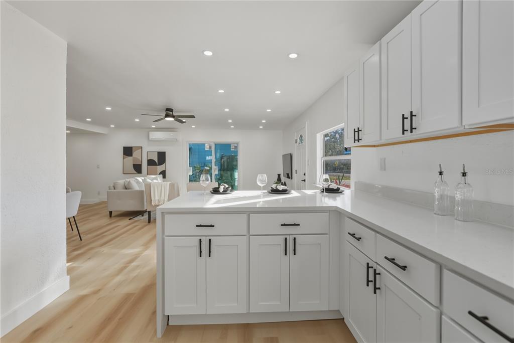 542 64th Street South St. Petersburg, FL 33707 - Photo 15 of 53 a kitchen with sink and cabinets