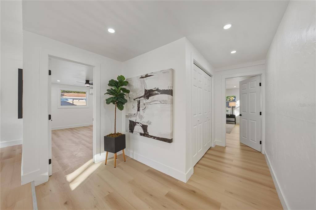 542 64th Street South St. Petersburg, FL 33707 - Photo 23 of 49 a view of a hallway with closet and a potted plant