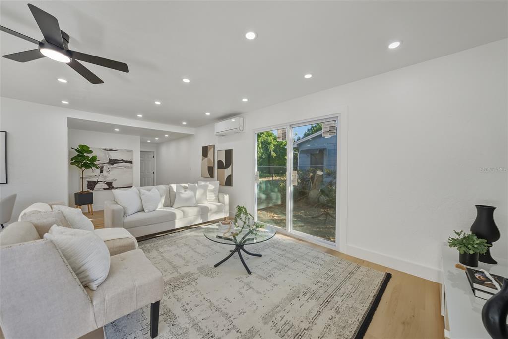 542 64th Street South St. Petersburg, FL 33707 - Photo 5 of 49 a living room with furniture