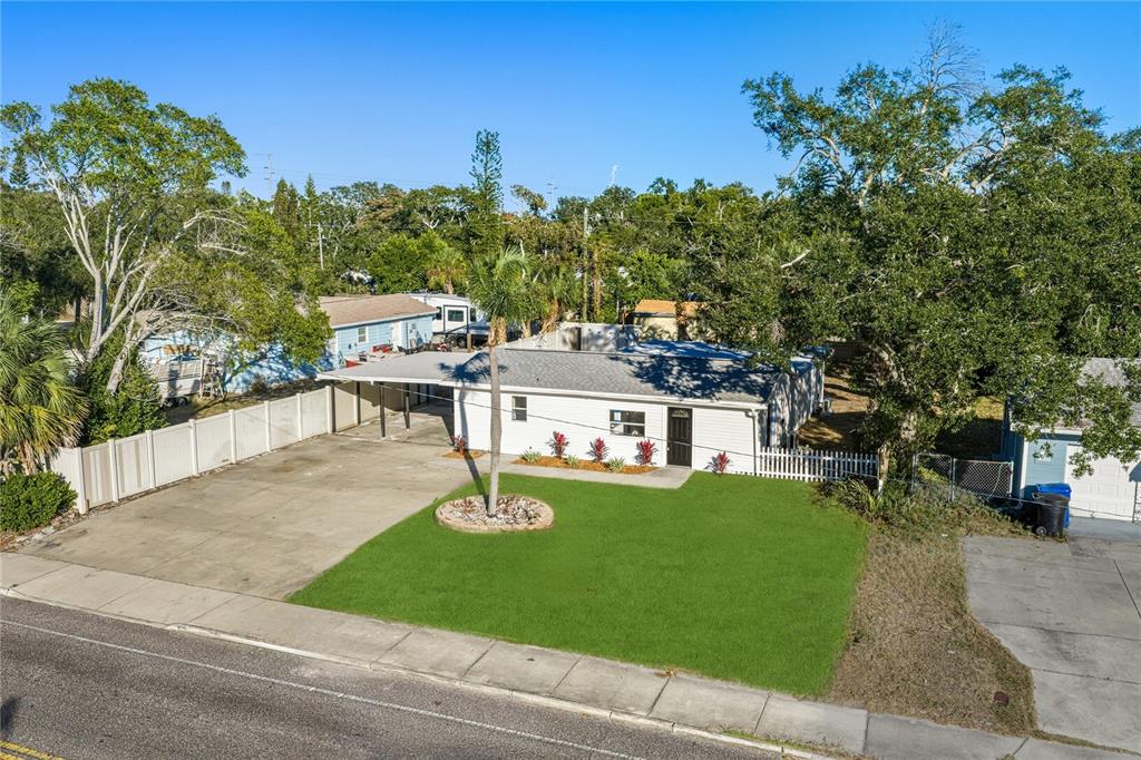 542 64th Street South St. Petersburg, FL 33707 - Photo 51 of 53 a view of a house with a yard