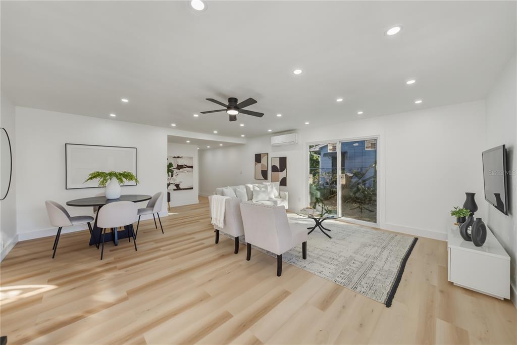 542 64th Street South St. Petersburg, FL 33707 - Photo 9 of 49 a living room with furniture and a rug
