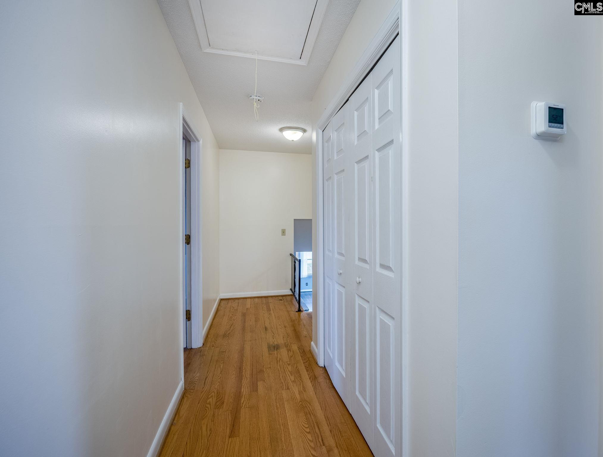 560 Edisto Street Batesburg, SC 29006 - Photo 35 of 49 a view of a hallway with wooden floor