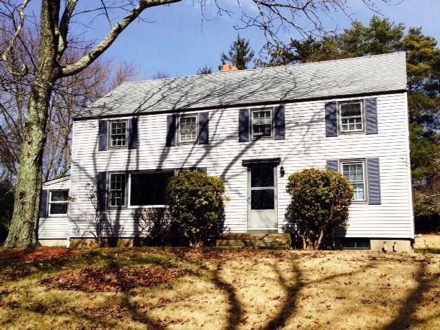 77 Ball Hill Road Mansfield, CT 06268 - Photo 1 of 1 a front view of a house with a yard