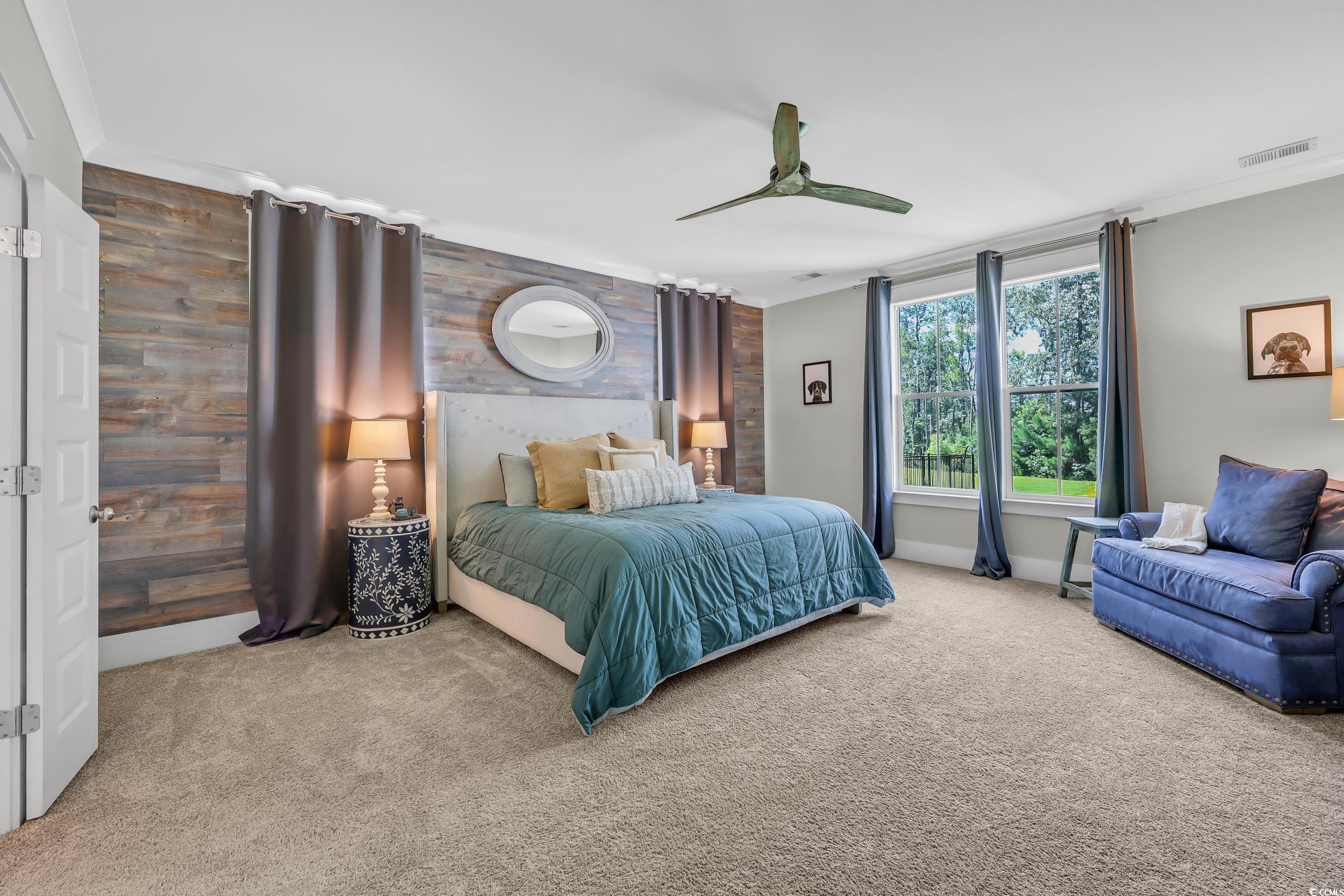 3005 Purity Place Loop Murrells Inlet, SC 29576 - Photo 16 of 36 Bedroom with carpet, a ceiling fan, and an accent