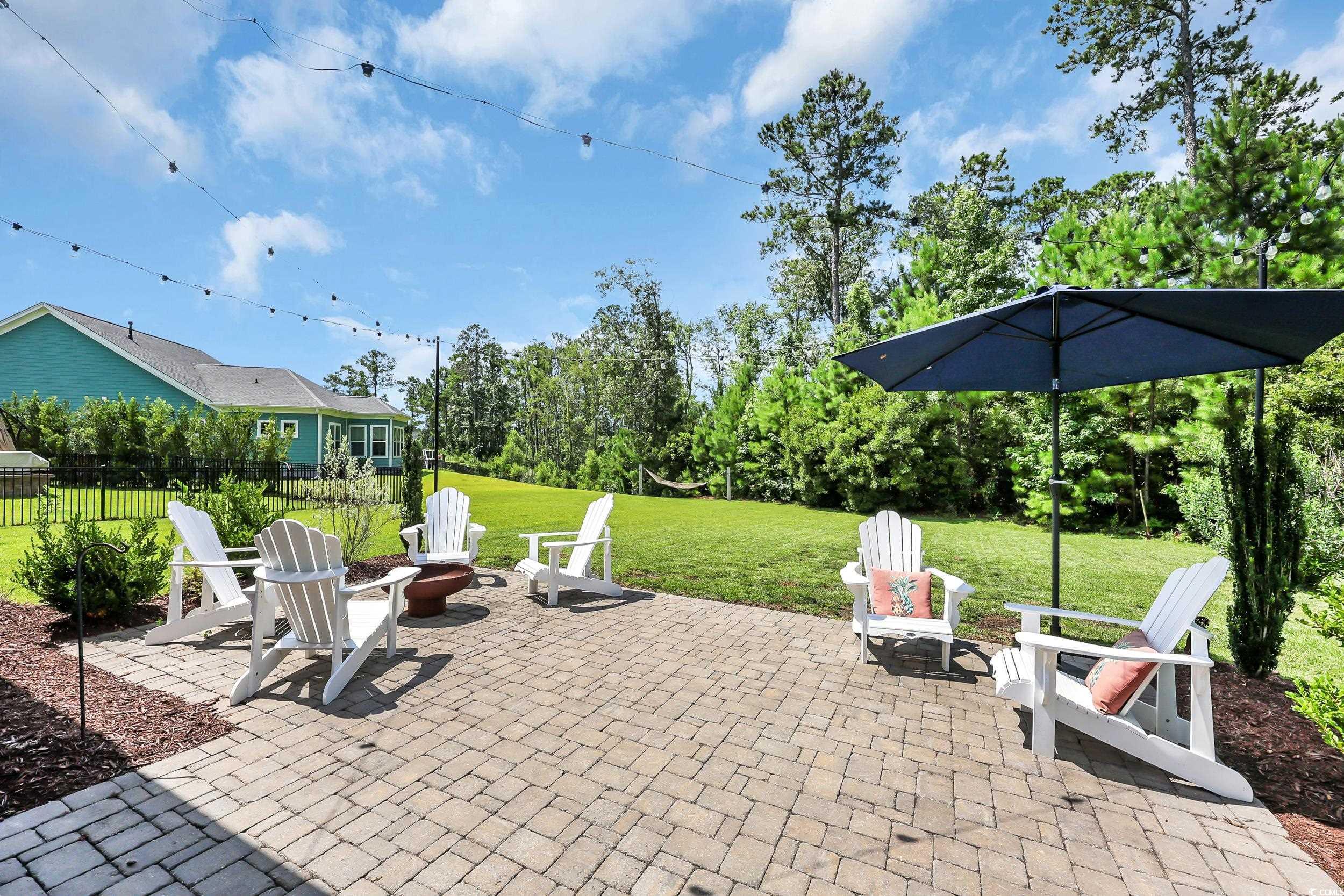 3005 Purity Place Loop Murrells Inlet, SC 29576 - Photo 30 of 36 View of patio with an outdoor fire pit