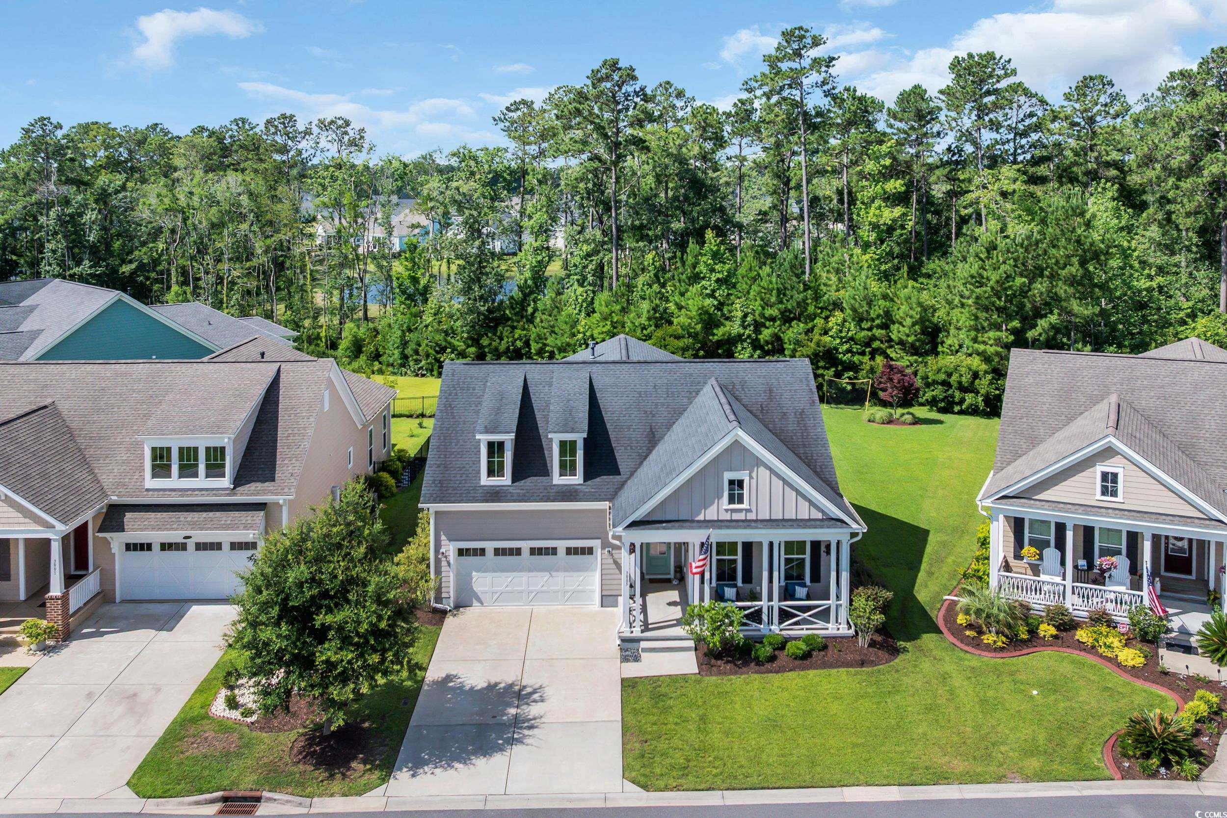 3005 Purity Place Loop Murrells Inlet, SC 29576 - Photo 31 of 36 Craftsman house featuring a porch, driveway, a fro