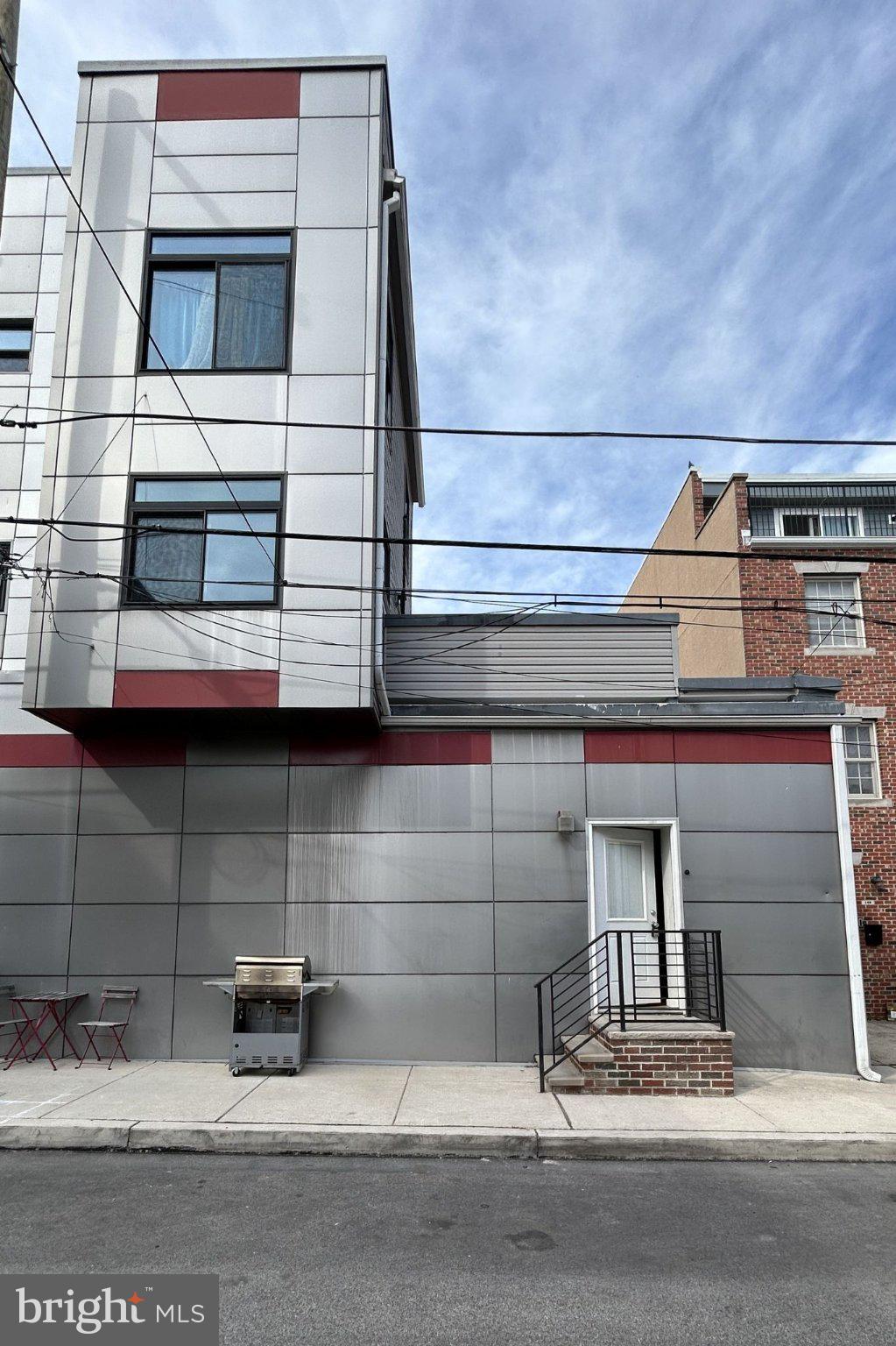 1713 South 2nd Street, Unit B Philadelphia, PA 19148 - Photo 15 of 15 Modern urban facade with sleek lines.