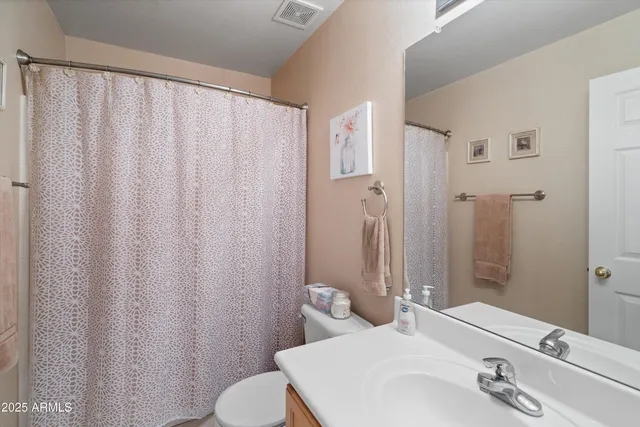 a swimming pool with outdoor seating and yard