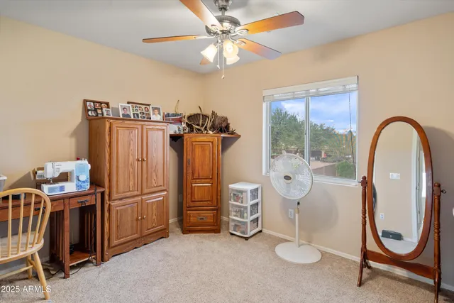 a view of a chairs and table in the garden