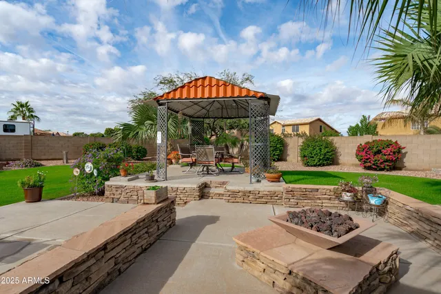 a view of a garden with houses