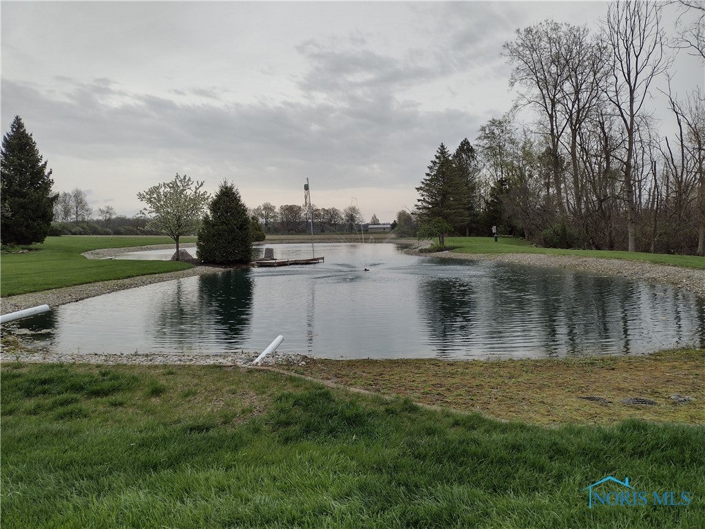 124 Country Club Road Bryan, OH 43506 - Photo 7 of 49 Well maintained pond stocked w/Coy, Blue Gill, Amers