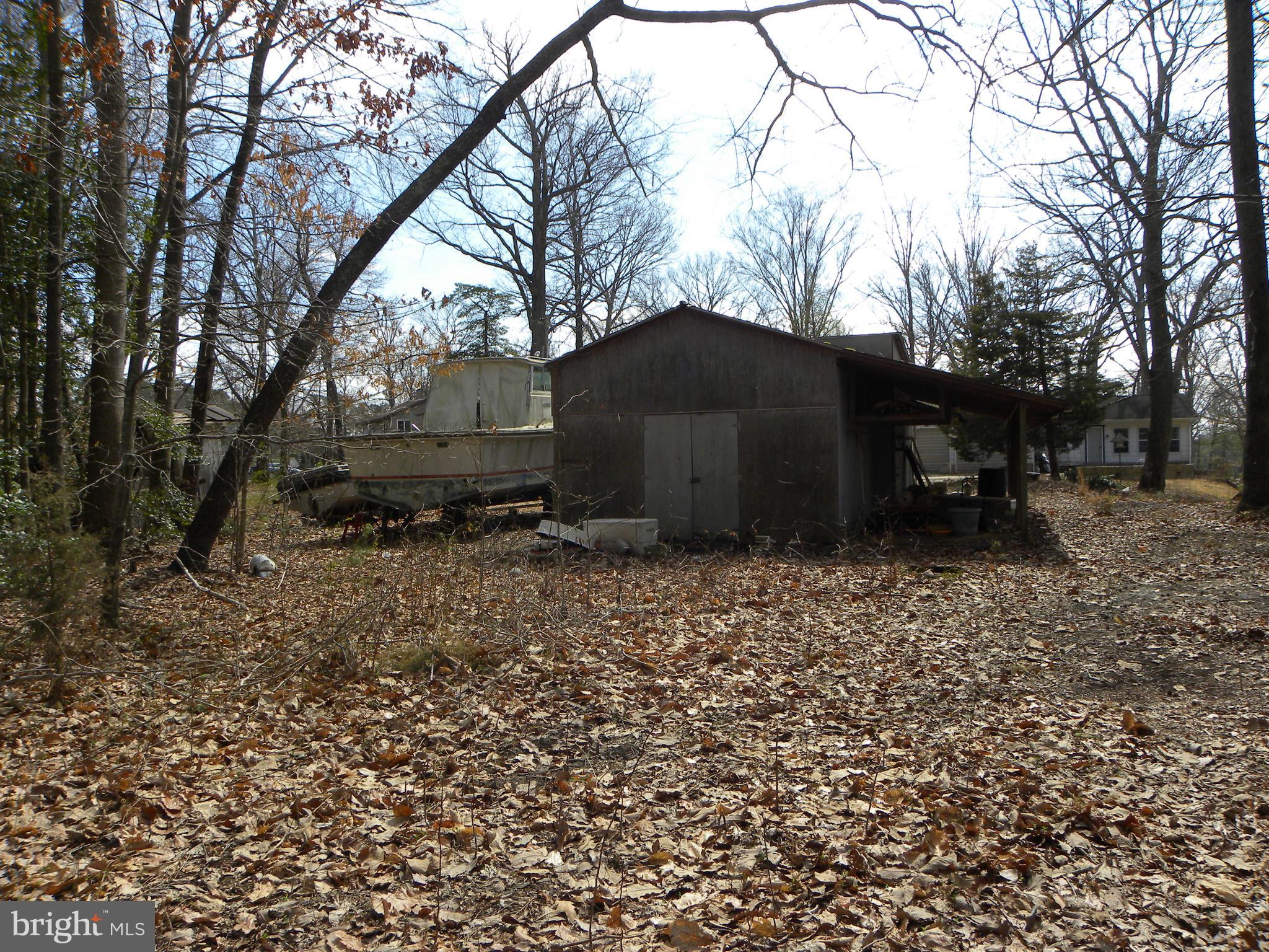 27 Russell Road Leonardtown, MD 20650 - Photo 11 of 26 Old storage building on lot.