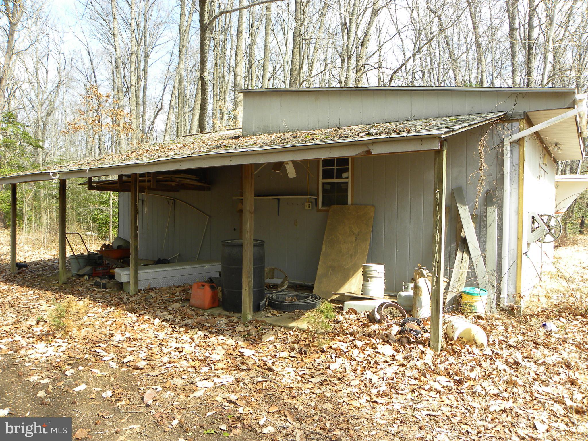 27 Russell Road Leonardtown, MD 20650 - Photo 2 of 26 Lean to section of storage building.