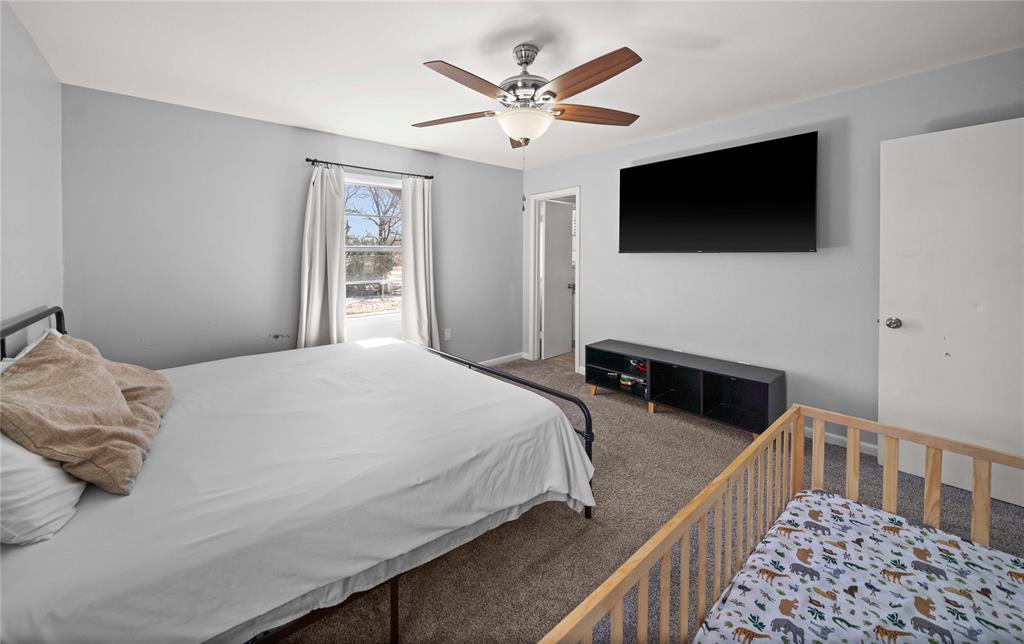 6155 Kathy Drive Murchison, TX 75778 - Photo 20 of 26 a bedroom with bed tv and window