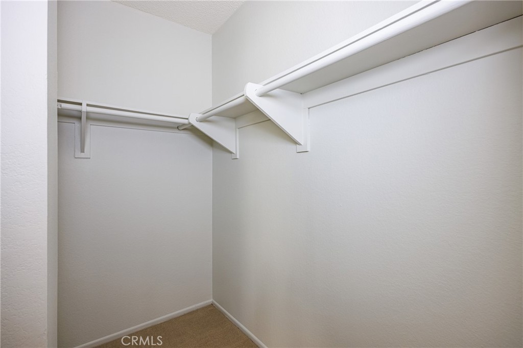 25885 Trabuco Road, Unit 206 Lake Forest, CA 92630 - Photo 17 of 40 a view of an empty walk in closet