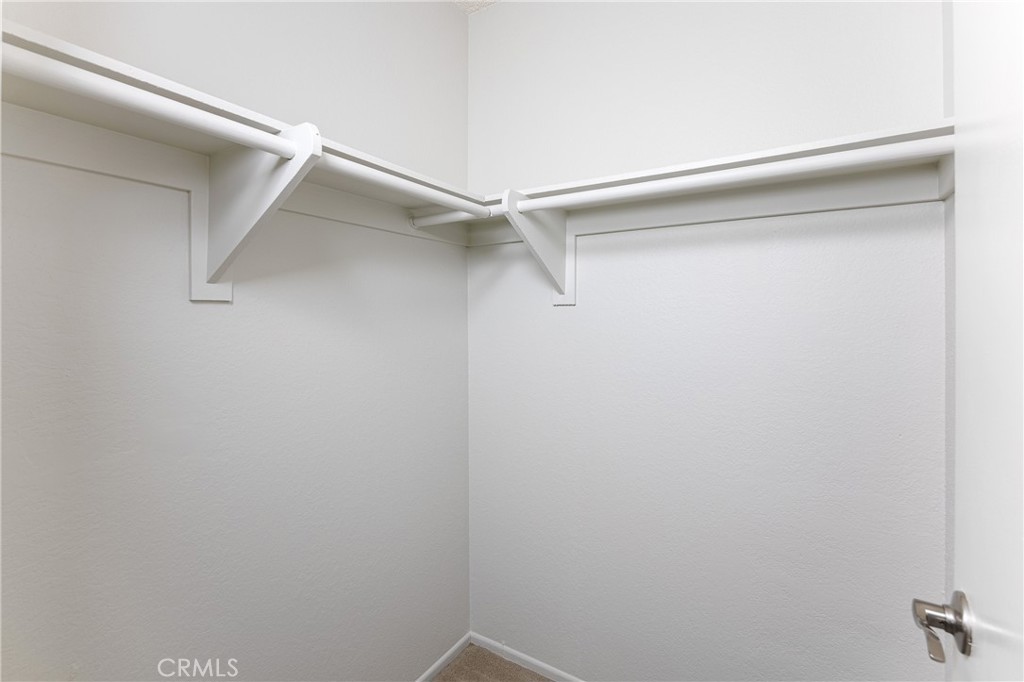 25885 Trabuco Road, Unit 206 Lake Forest, CA 92630 - Photo 22 of 40 a view of a room with shelf on the wall