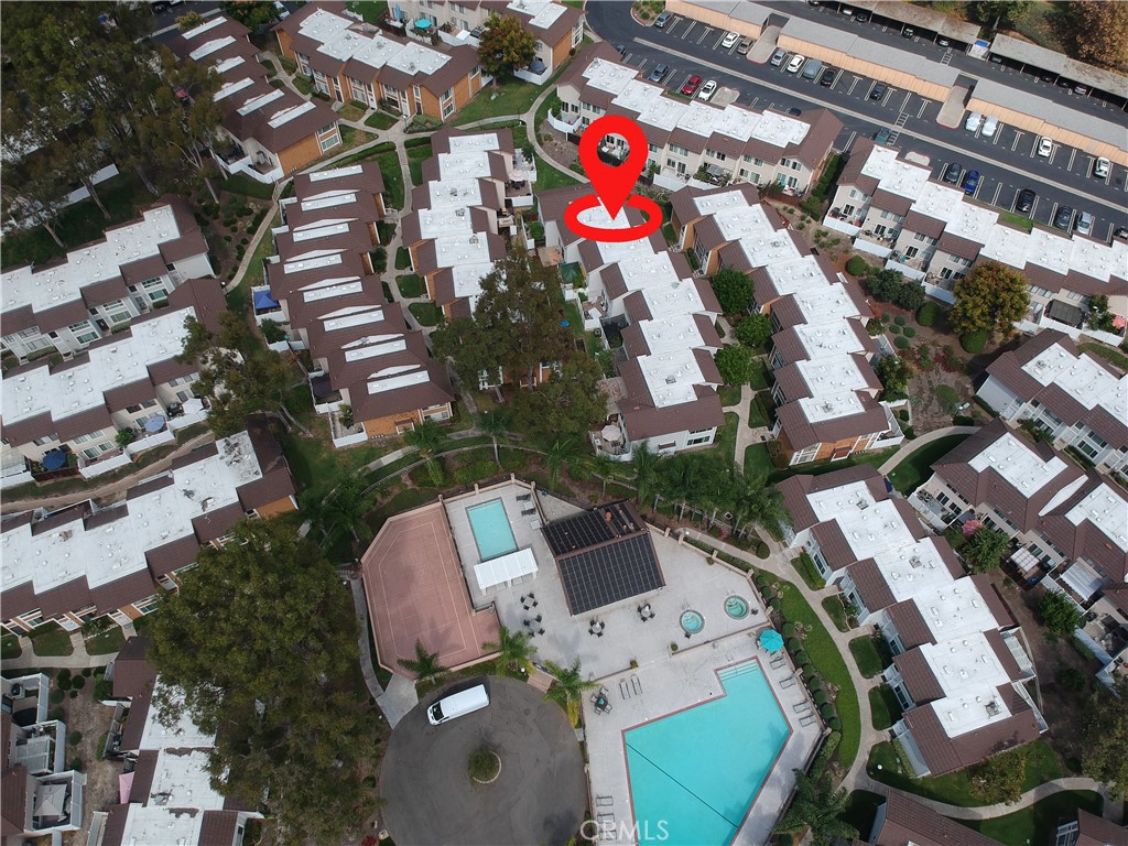 25885 Trabuco Road, Unit 206 Lake Forest, CA 92630 - Photo 38 of 40 an aerial view of a house with a yard and lake view