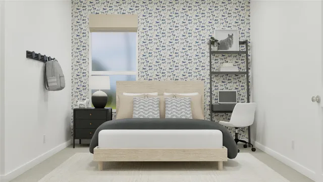 a bed sitting in a bedroom next to a window with lamp