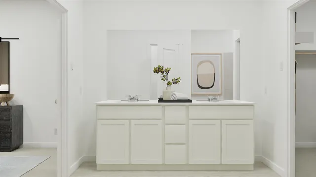 a bathroom with mirror and