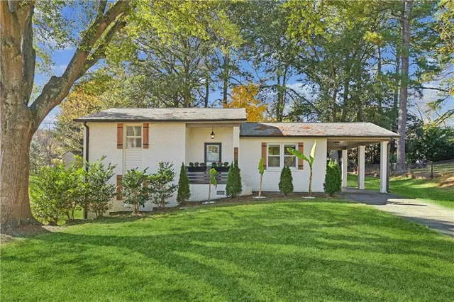 front view of a house with a yard