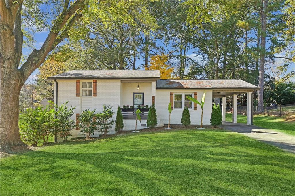 front view of a house with a yard